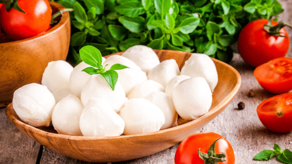 mozzarella cheese exhibits a smooth and shiny surface